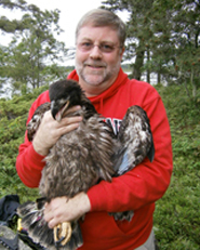 Dr. Bowerman with eagle